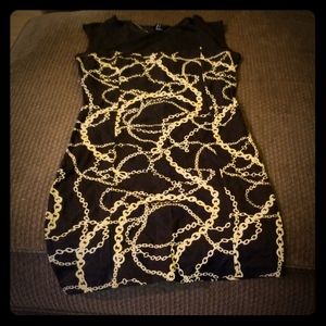 Sleeveless black and gold dress